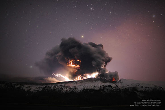 Volcanic lightning under the starry sky at Eyjafjallajokull in Iceland during a 2010 eruption. Image appears courtesy of Sigurdur Stefnisson.